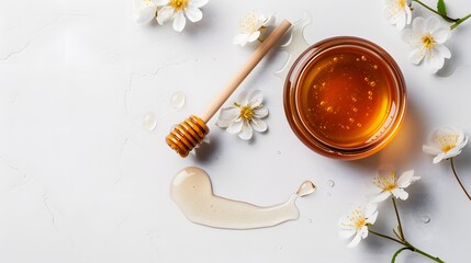 Fototapeta premium Honey jar wooden dipper flowers white background, fresh organic healthy
