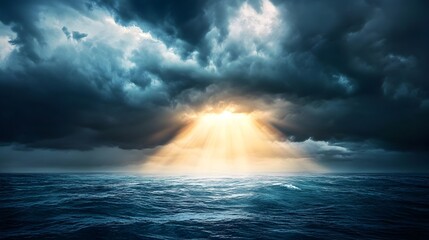 Obraz premium Dramatic Sun Rays Breaking Through Dark Storm Clouds Over Turbulent Ocean Waves Offering Hope After