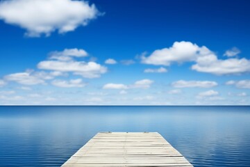 Obraz premium Wooden Dock Extending into Calm Ocean Waters