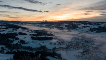Sunset in Allgäu in the german alps in winter