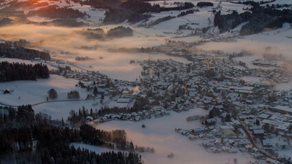 Sunset in Allgäu in the german alps in winter