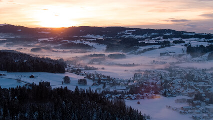 Sunset in Allgäu in the german alps in winter