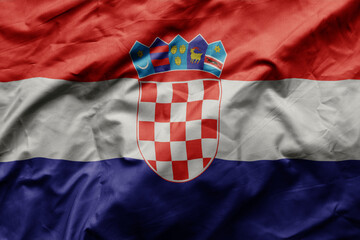 waving colorful realistic national flag of croatia .