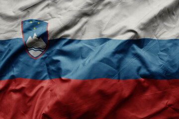 waving colorful realistic national flag of slovenia .