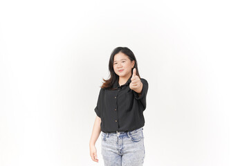 Young Asian woman showing thumbs up, okay or agree concept wearing Black t-shirt and jeans isolated on white background