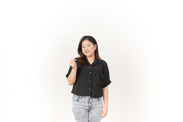 Fototapeta premium Young Asian woman Showing korean love finger wearing Black t-shirt and jeans isolated on white background