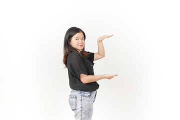 Young Asian woman Measuring and Showing Big Product wearing Black t-shirt and jeans isolated on white background