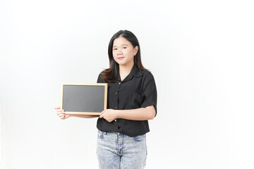 Young Asian woman Showing and holding black or chalk board wearing Black t-shirt and jeans isolated on white background