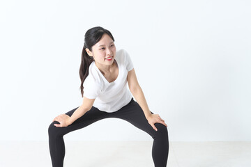 Fototapeta premium ストレッチをしている女性