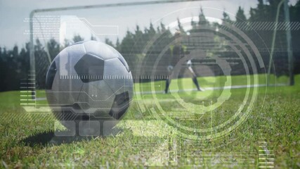 Soccer ball on grass with goal animation over data processing elements - Powered by Adobe