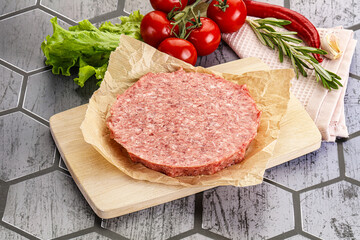 Raw beef uncooked burger cutlet