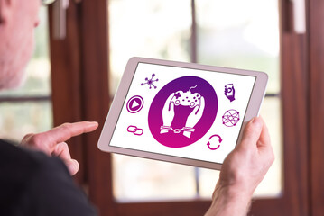 Video game addiction concept on a tablet