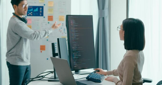 Group adult Asia male female software developers mentor leader manager talk strategy plan to executive write prompt AI bot IT app program nomad, video game, data center. Whiteboard slideshow code.