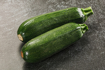 Raw green ripe zucchini vegetable