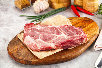 Raw pork neck steak for grill