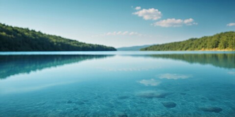 Obraz premium lake blue water smooth surface simple nature background.