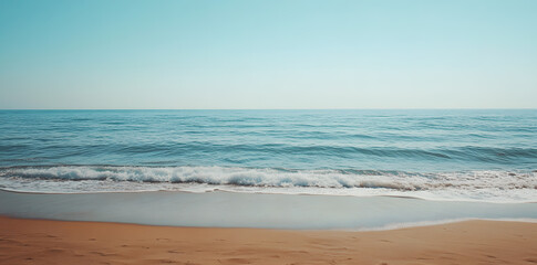 Obraz premium View of sand beach and blue sea summer background
