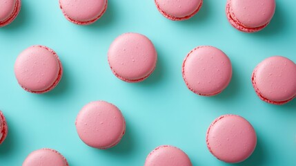 Obraz premium French sweet Strawberry Pink macaroons on color background,French macaron cookies baked pattern,french macaroons,Paris Pastry,bakery and branding concept,Delicious french desserts,copy space.