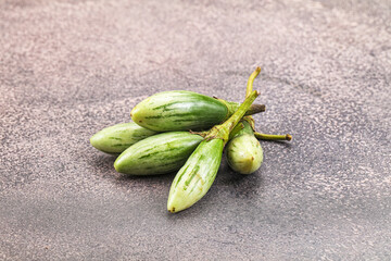 Small organic young green eggplant