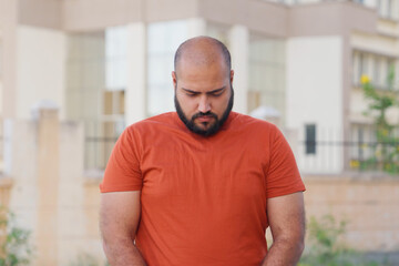 Bald indian Man feeling Guilty