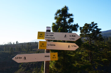 Hiking trail with arrow pointers sign in Tenerife, Canary Islands, Spain.Travel or vacation concept.