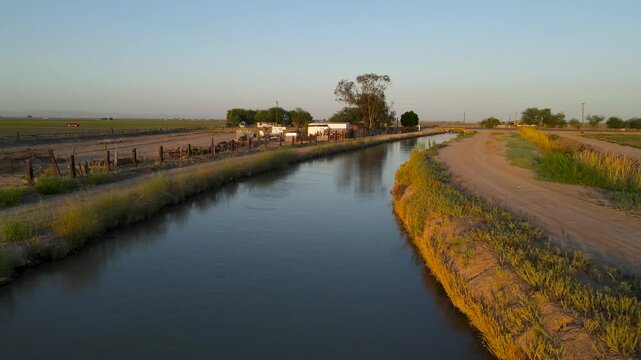 aerial view of El Cento canal at sunset, golden hour