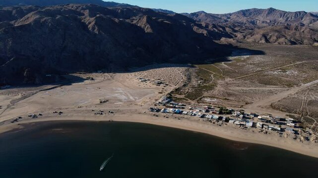 Aerial pan of Baja California coastline at sunset