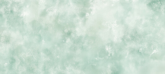 Abstract light green watercolor background with a soft vintage-style texture