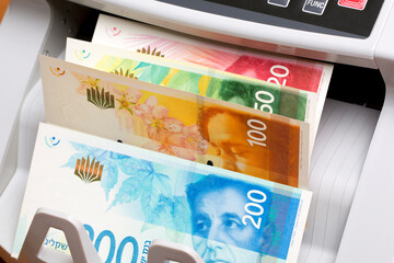 Israeli new shekel in the counting machine