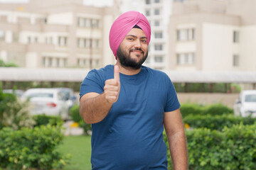 Happy Sikh Indian Man Showing Thumbs Up