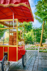 Istanbul, Sultanahmet District, Red cart for simits, simit is a very tasty bagel-shaped bread with sesame seeds
