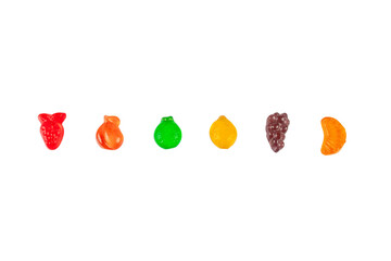 Fruit flavored worm shape, jelly candies. Isolated on transparent background.