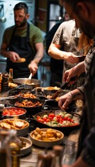 Middle-Aged Friends Learning to Make Spanish Tapas in a Cooking Class - Small, Flavorful Dishes