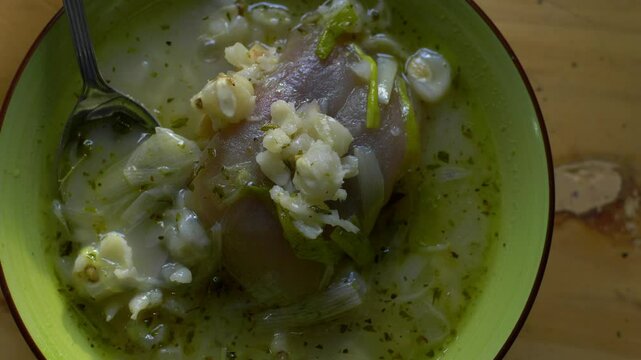 Caldo de pata de vaca is a traditional dish in the Ecuadorian highlands made from beef leg. Serving on a plate