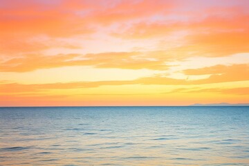 Fototapeta premium Serene Sunset Over Calm Ocean Waters