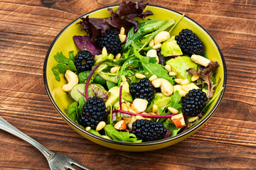 Plate of colorful fresh salad.