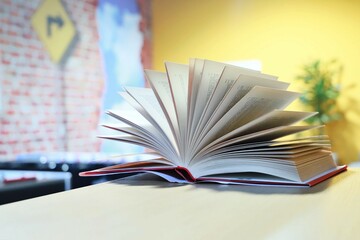 open books on the table. close-up of a fanned book