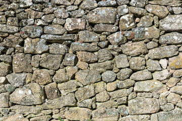 Detail of a granite wall part of an old historic house Portugal