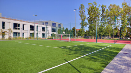 Artificial turf football pitch near school. 