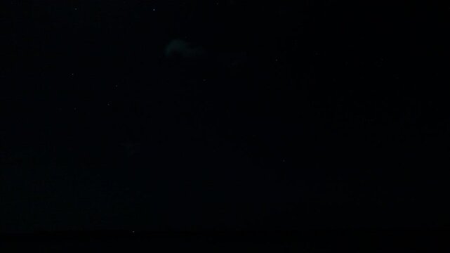 Late sunset passes into night and the stars emerge.