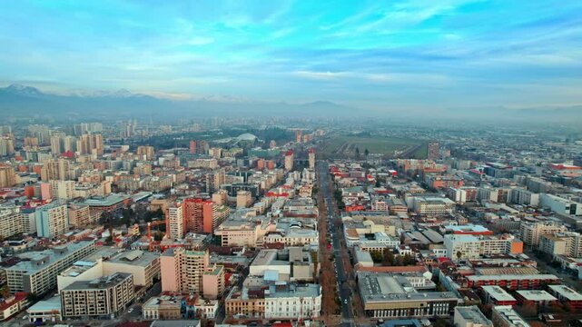 Aerial cityscape of Santiago de Chile Republica Neighborhood at daylight urban buildings with andean cordillera background around Alameda avenue