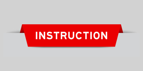 Red color inserted label with word instruction on gray background