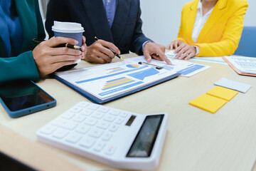 A busy office environment where teams collaborate on creative projects, finance, and marketing strategies using data, charts, and reports, engaging in brainstorming and training sessions to achieve bu