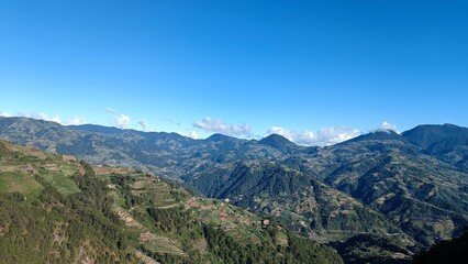 Buguias is a municipality located in the province of Benguet, Philippines. It is known for its cool climate, stunning mountainous landscapes, and as one of the country's leading vegetable-producing.