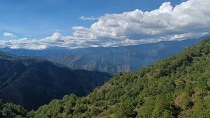 Fototapeta premium Buguias is a municipality located in the province of Benguet, Philippines. It is known for its cool climate, stunning mountainous landscapes, and as one of the country's leading vegetable-producing.