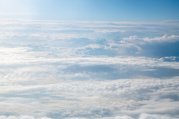 view of beautiful white clouds in the sky, natural background, view from plane, top view