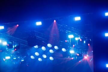 Blue light at a concert. Abstract background