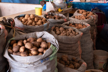 Sacks of potatoes on display at Pisac Pisaq Market, Peru
