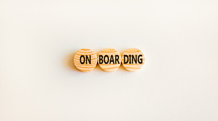 Onboarding success symbol. Concept word Onboarding on wooden circles. Beautiful white background. Business onboarding success concept. Copy space.