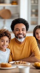 A multi-generational family gathered around a dining table, sharing a meal, with the grandparents looking at the camera and the younger members engaged in conversation